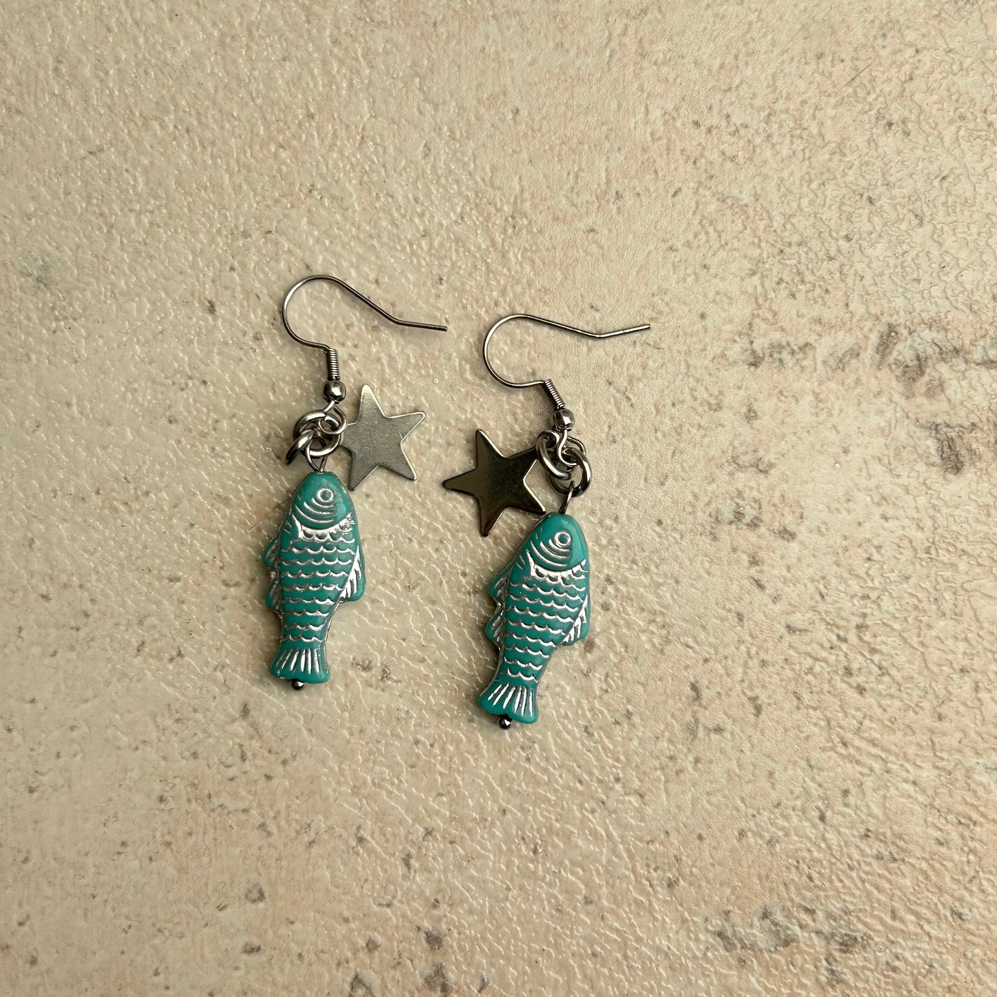 Silver on blue star hook earrings