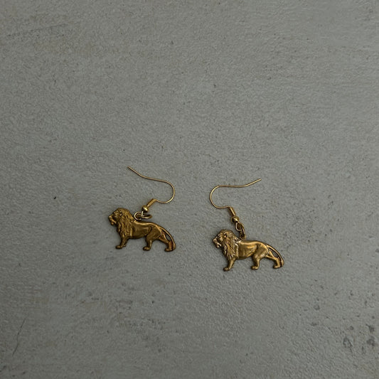 Lion earrings in gold tone