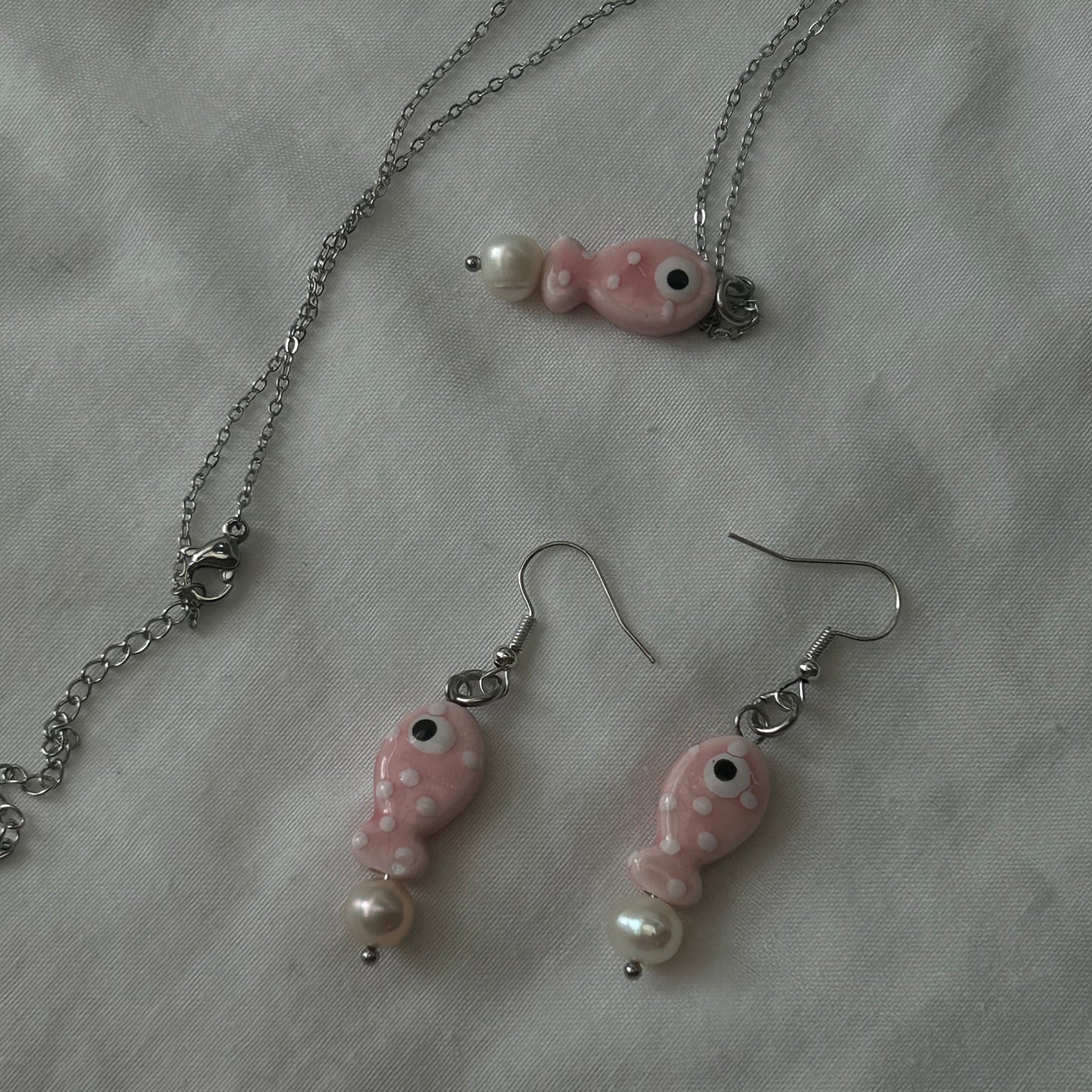 Pink ceramic polka dot fish set