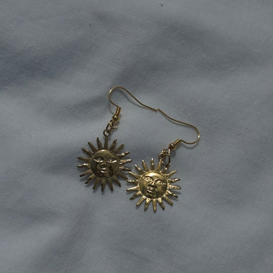 Gold sun earrings