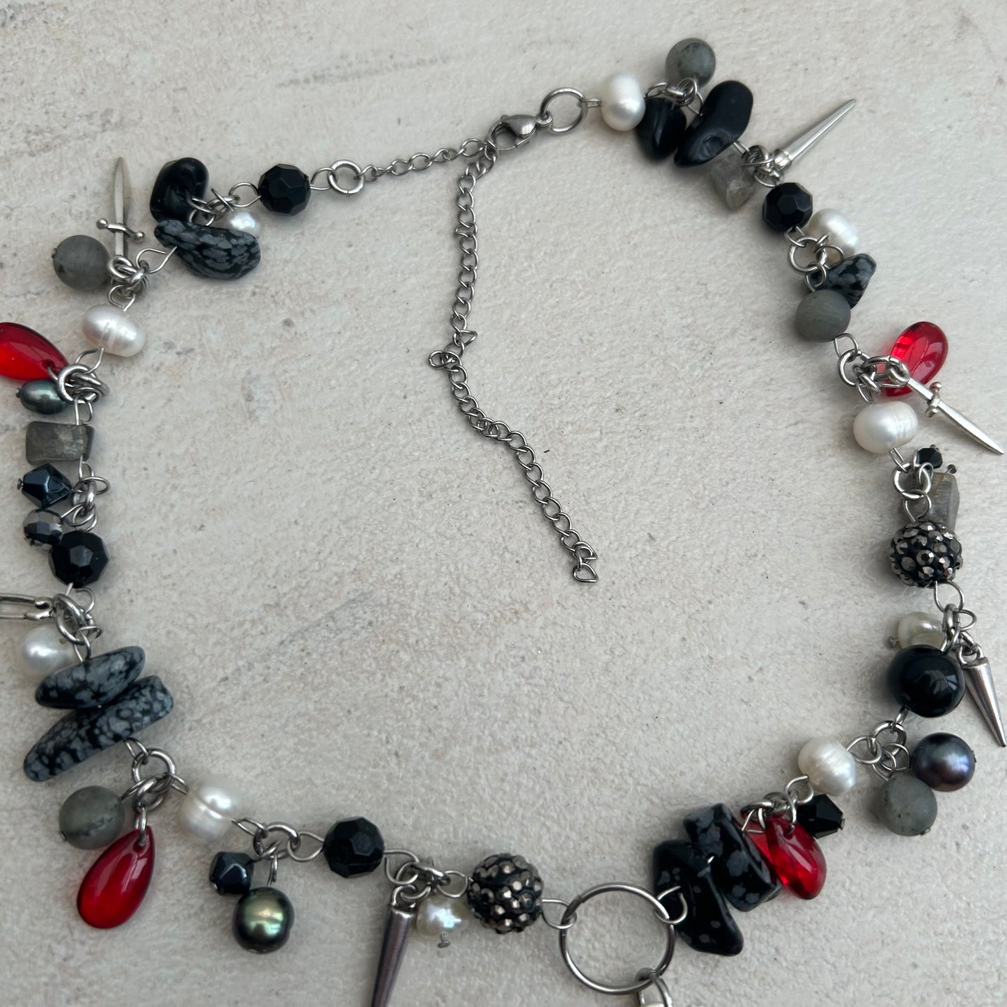 'Full of Woe' black, red and silver charm and glass cluster clutter necklace