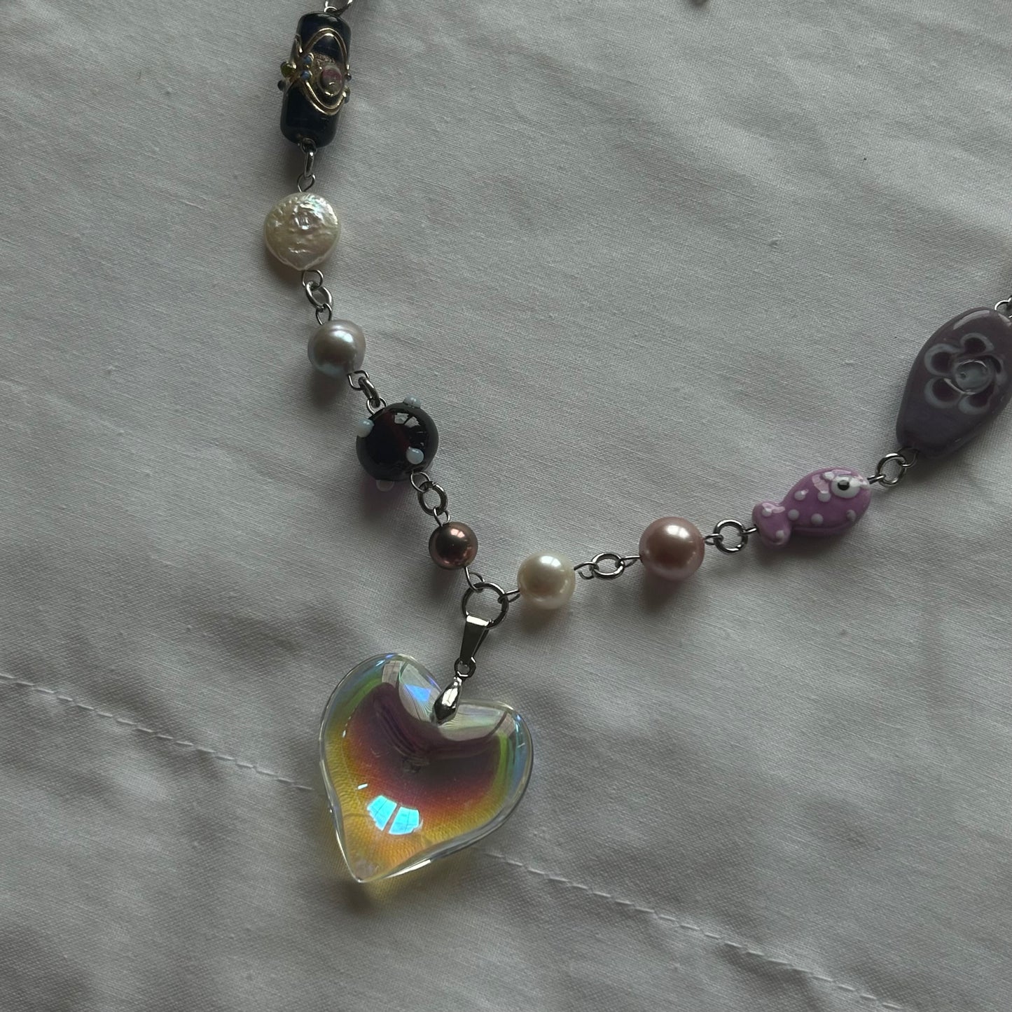 Iridescent glass heart necklace