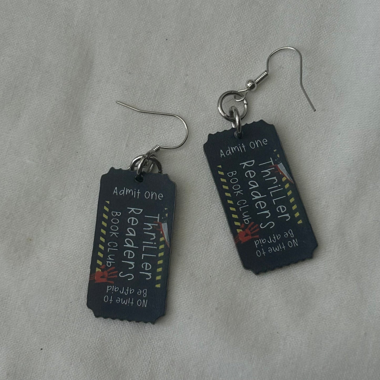 Thriller cinema ticket earrings