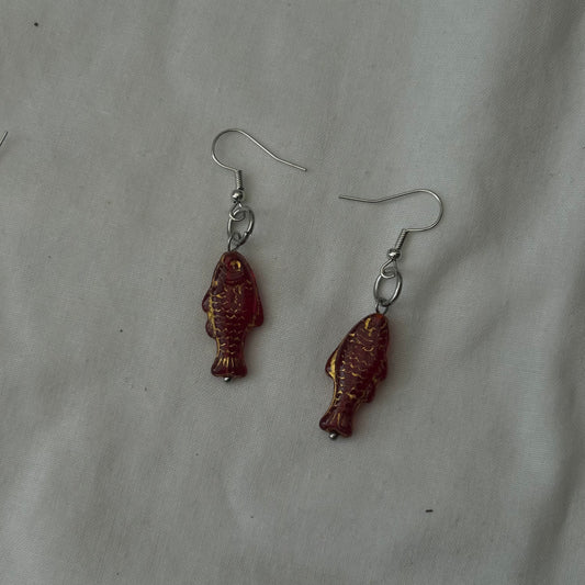 Gold on red fish earrings