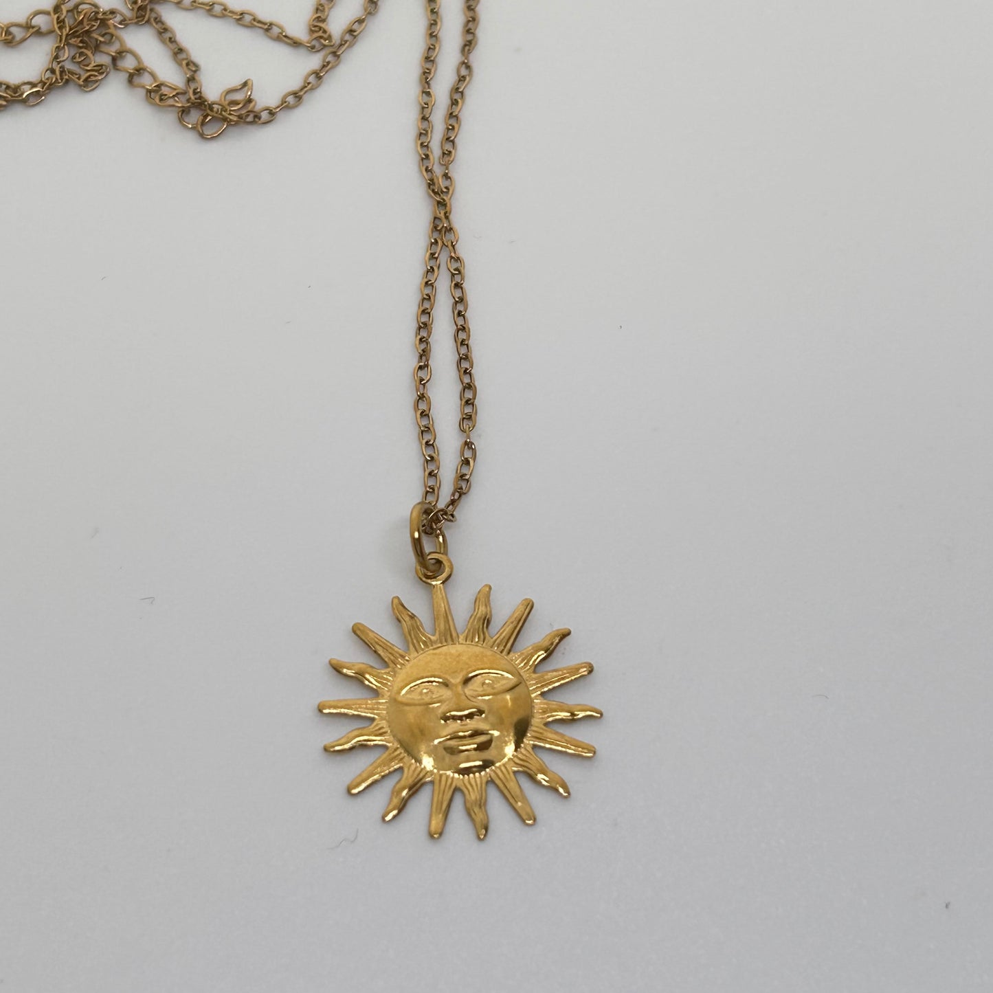 Gold sun stainless steel necklace