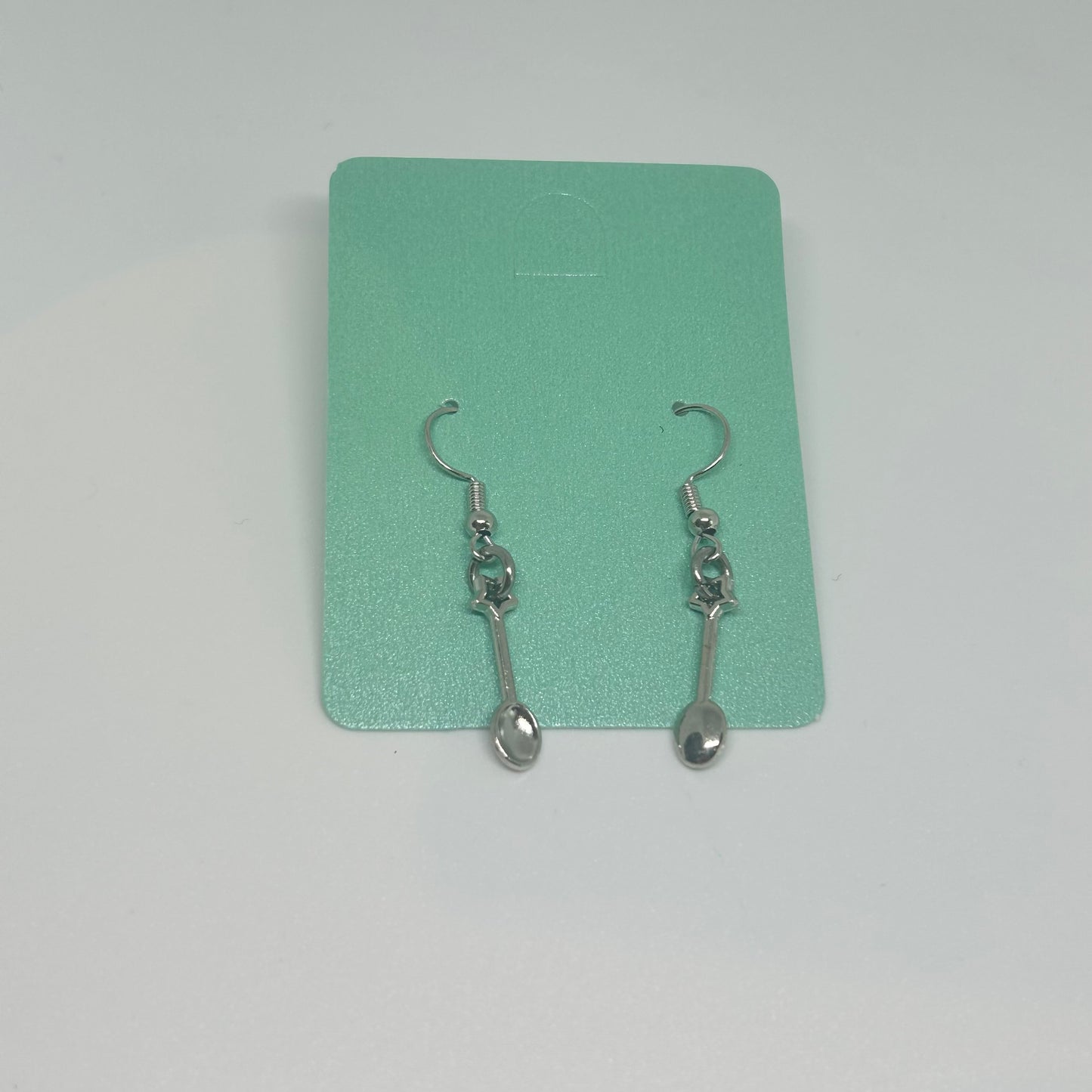Silver spoon star earrings