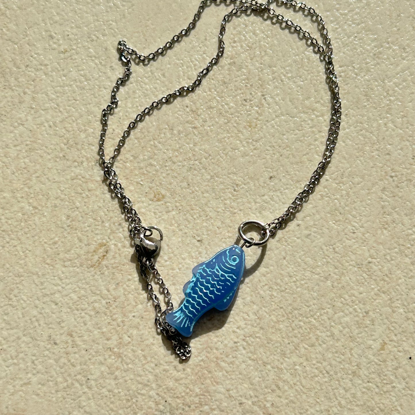 Light blue on blue fish necklace