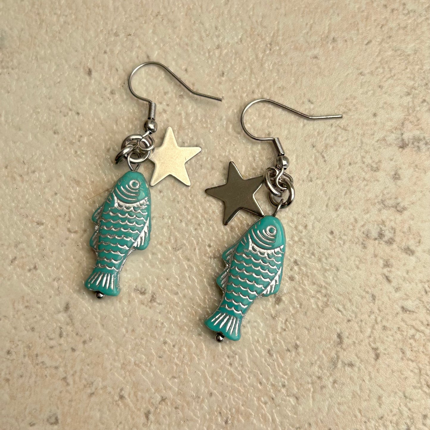 Silver on blue star hook earrings
