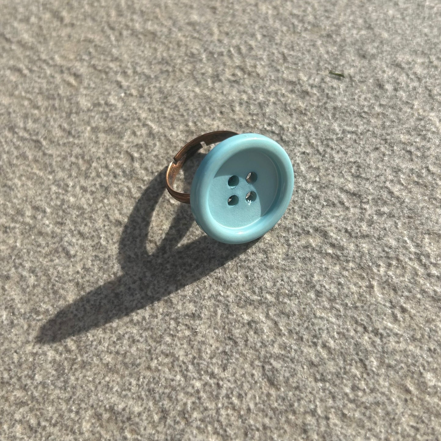Blue button ring