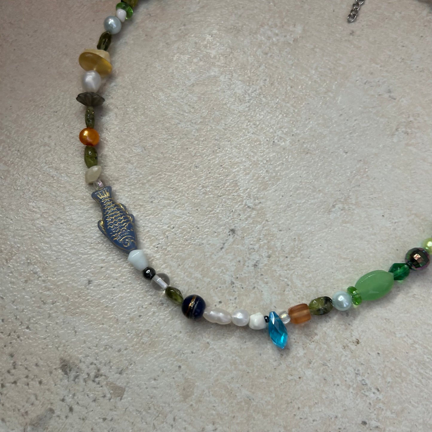 Gold on blue fish beaded necklace