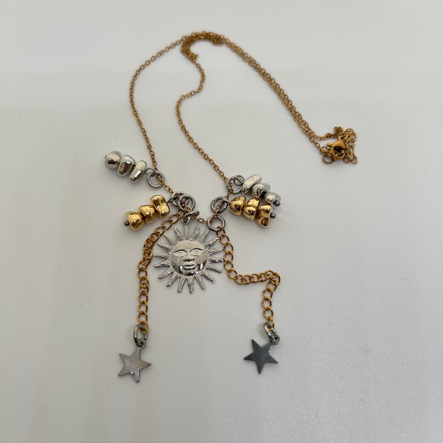 Silver sun mixed metal necklace