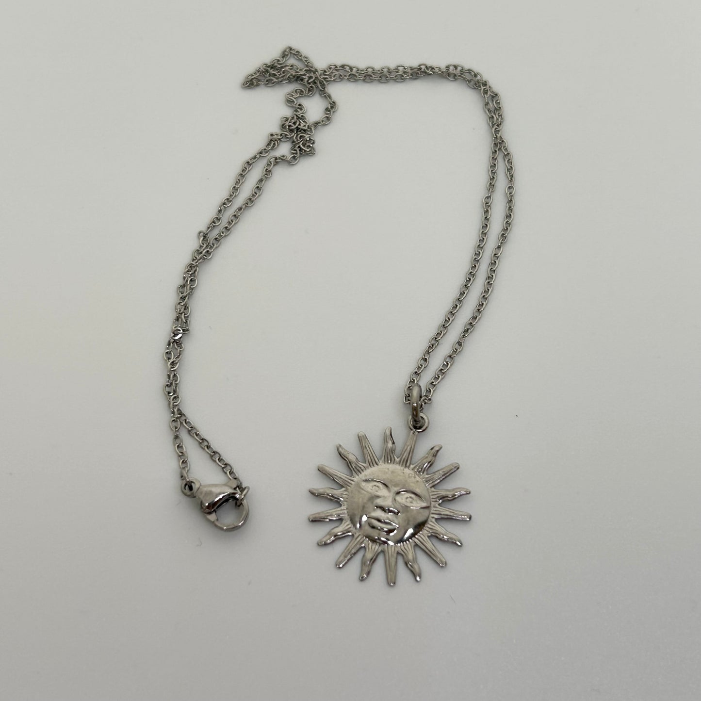Stainless steel silver sun necklace