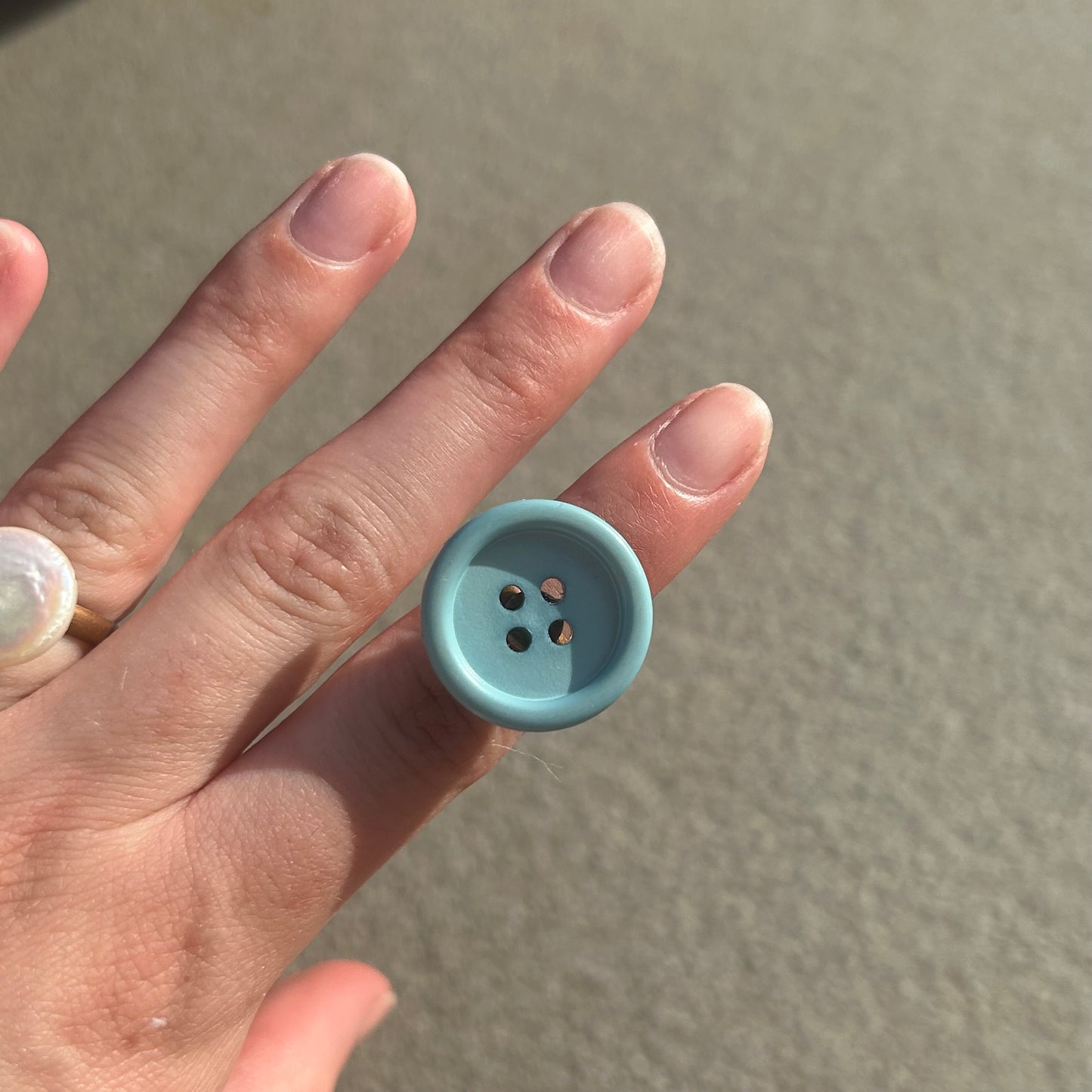 Blue button ring