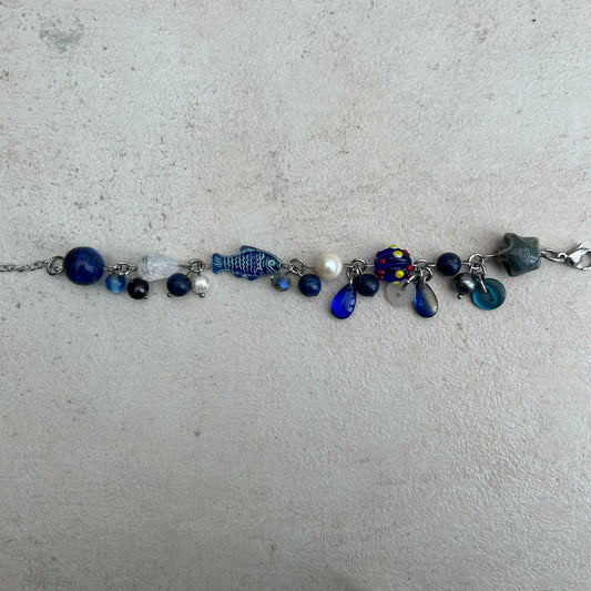 Blue glass fish cluster clutter bracelet