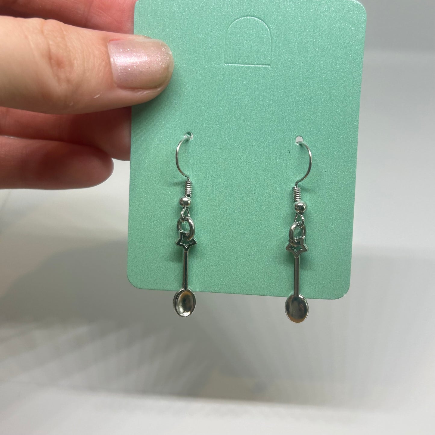 Silver spoon star earrings