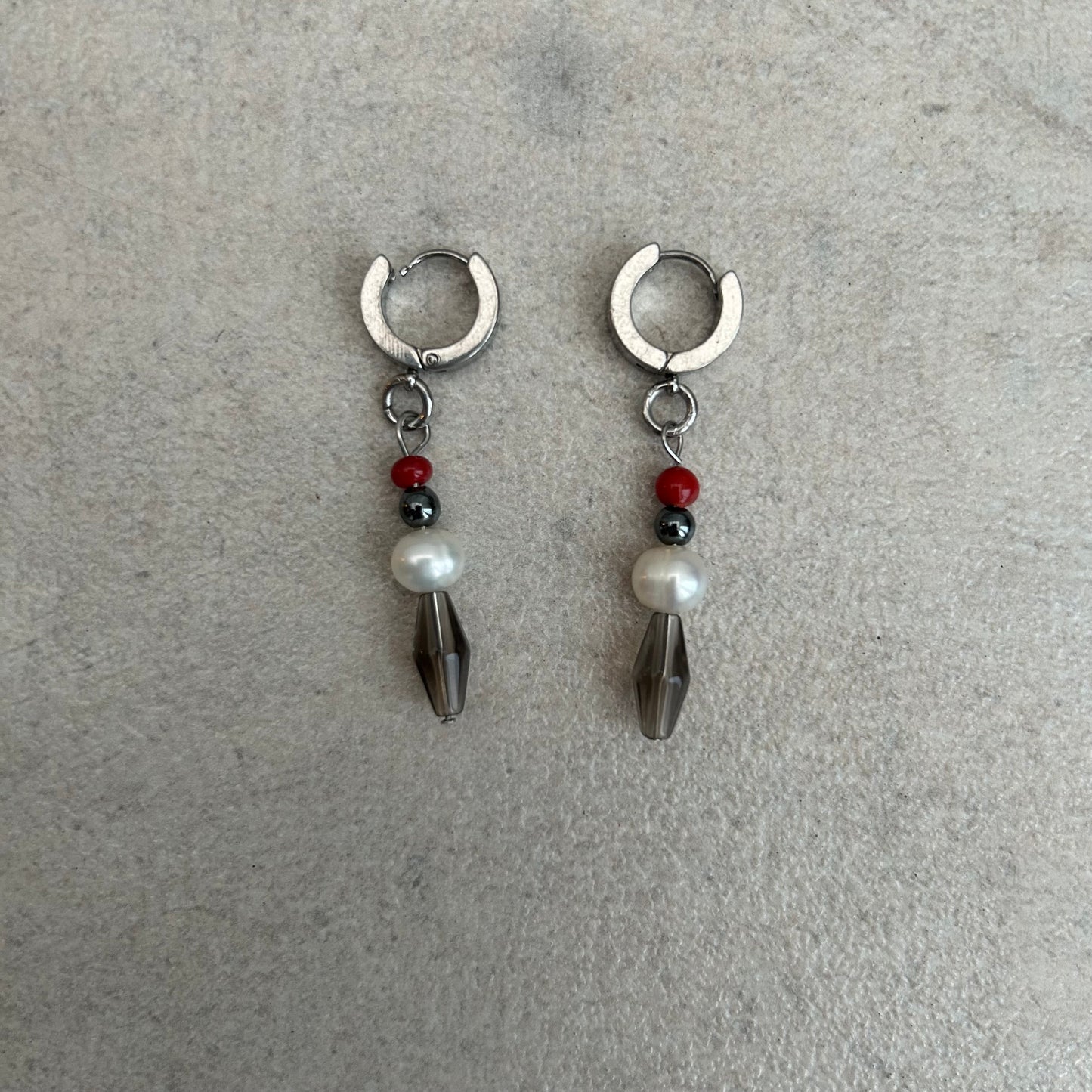 black white and red stainless steel huggie hoops