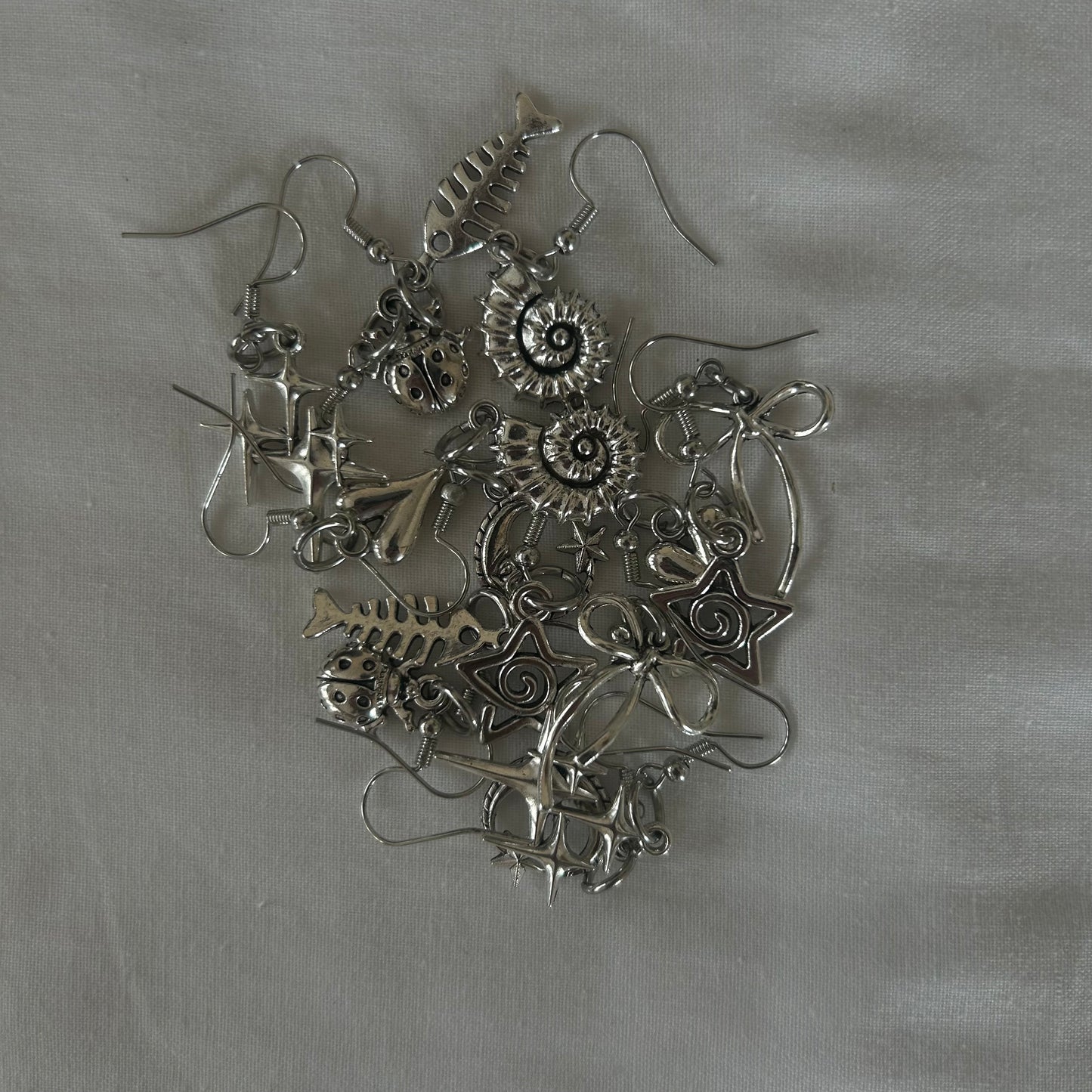 mystery earrings (silver tones)