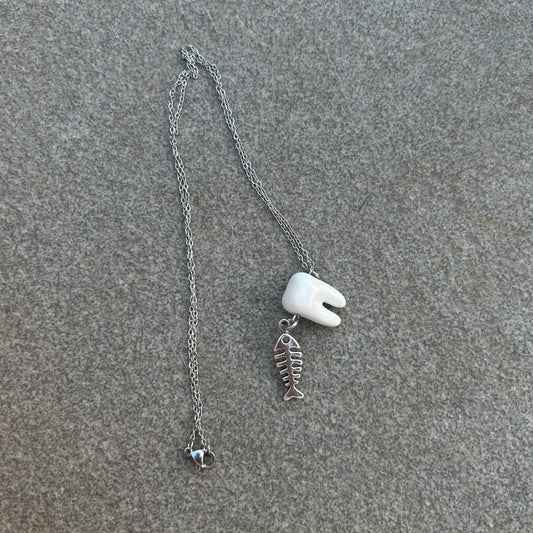 Rotting fish necklace