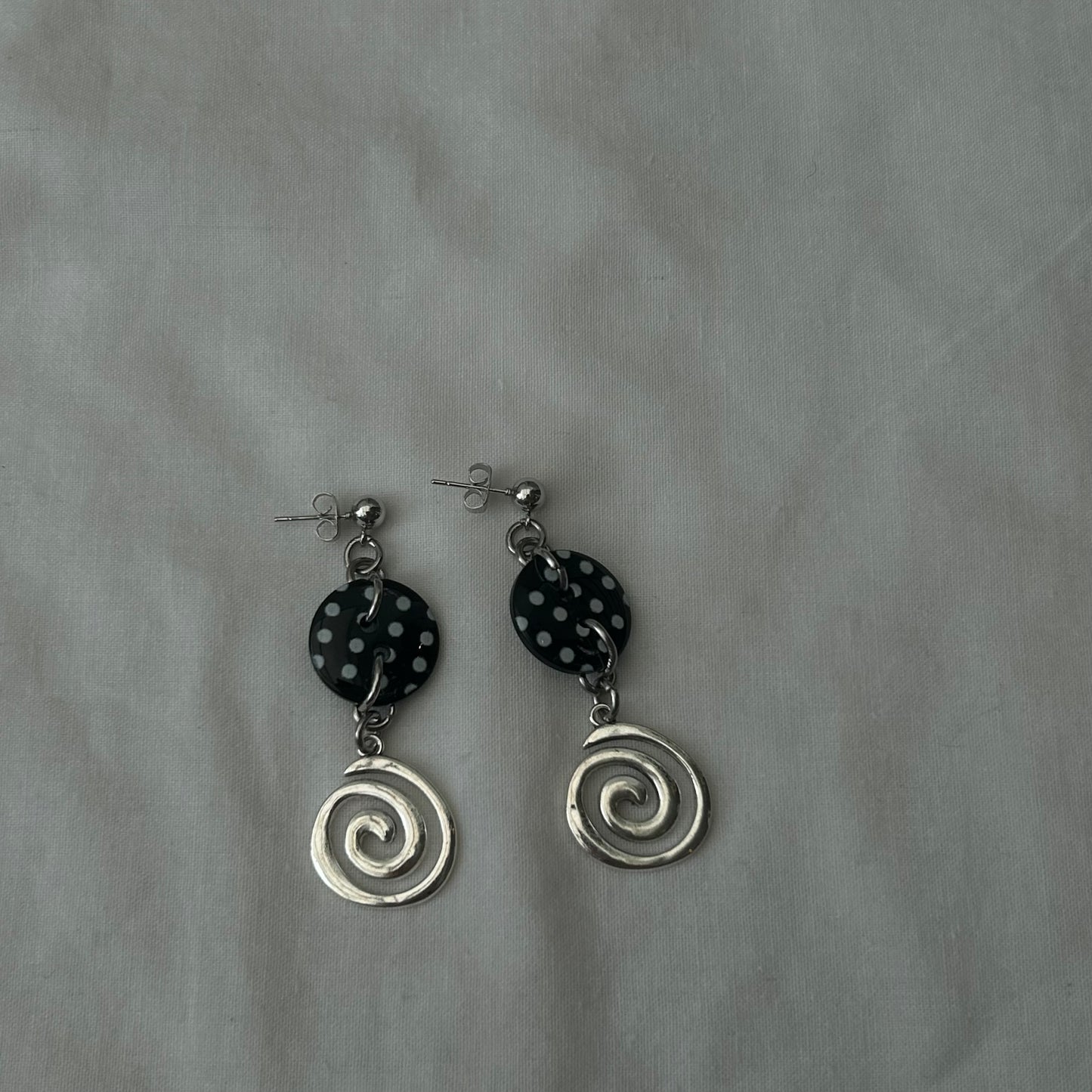 Polka dot spiral stud earrings