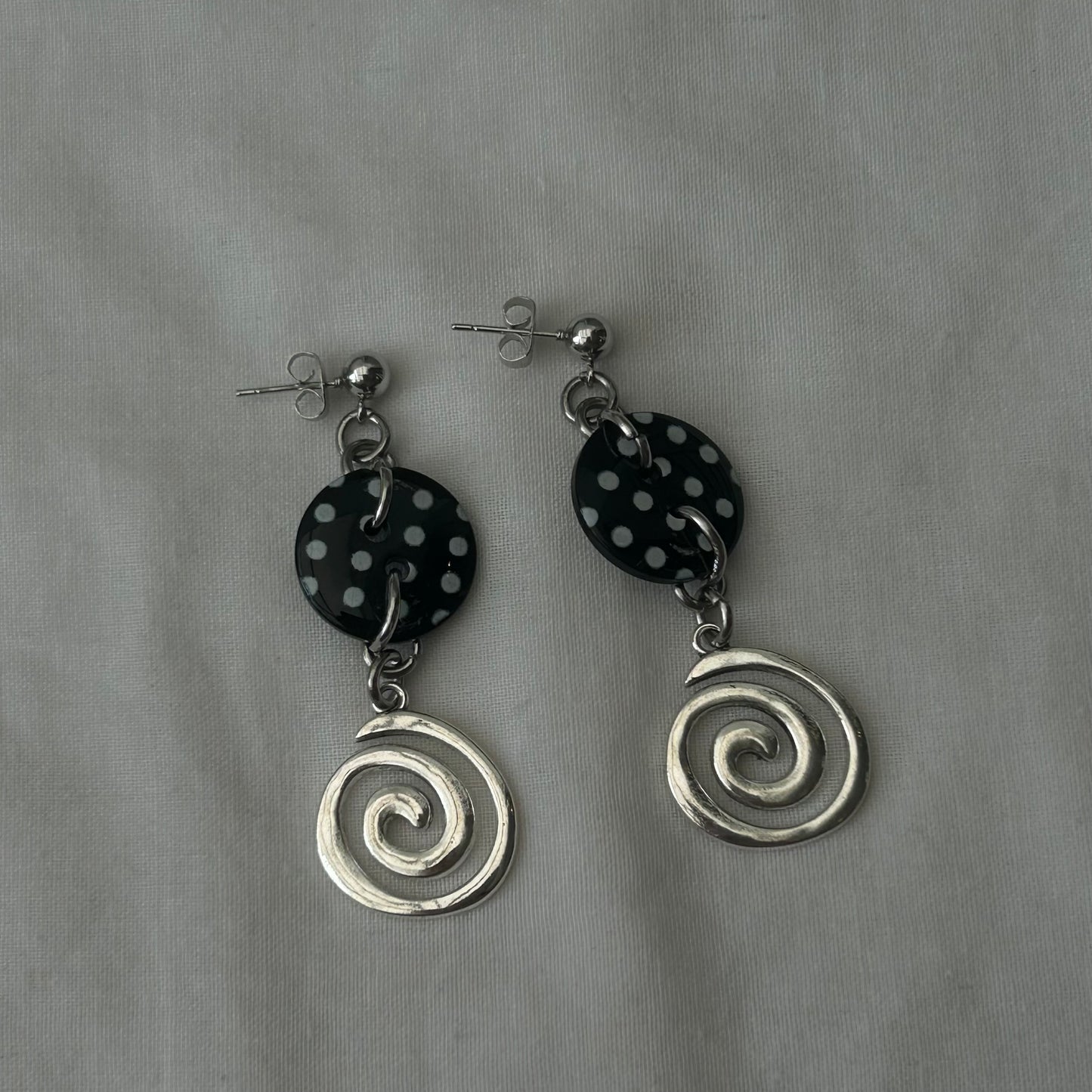 Polka dot spiral stud earrings